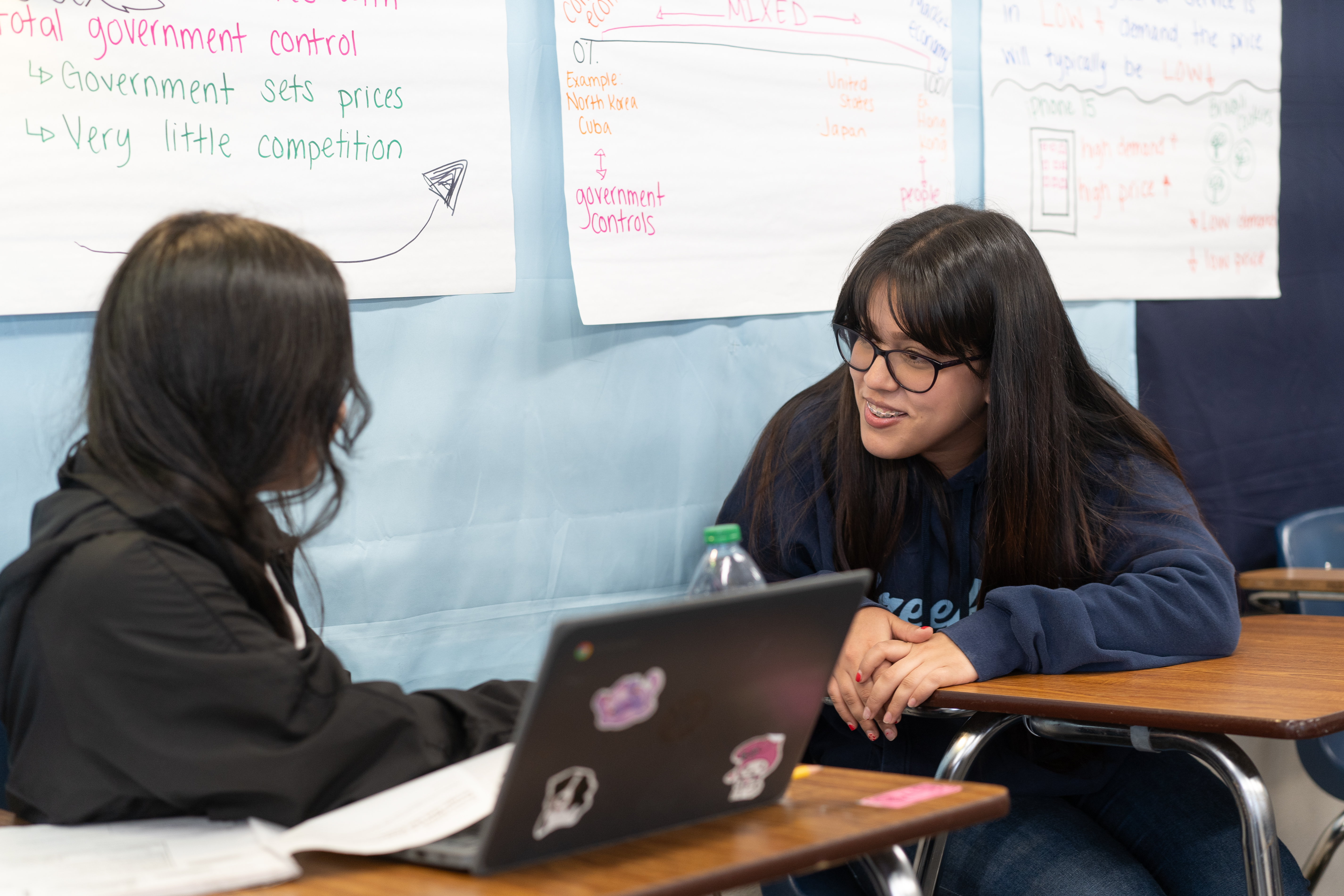 Skarlet Molina (right) chats with a classmate at Meadowcreek High School in Norcross, Georgia.