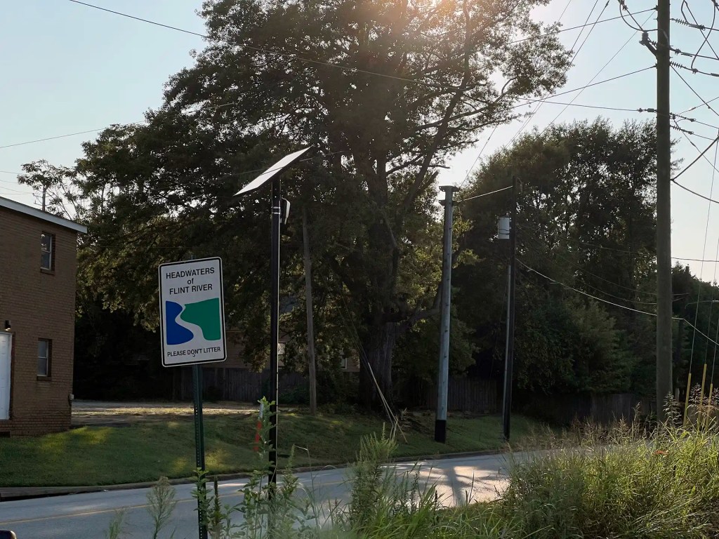 A sign marks the headwaters of the Flint River in East Point, Georgia.