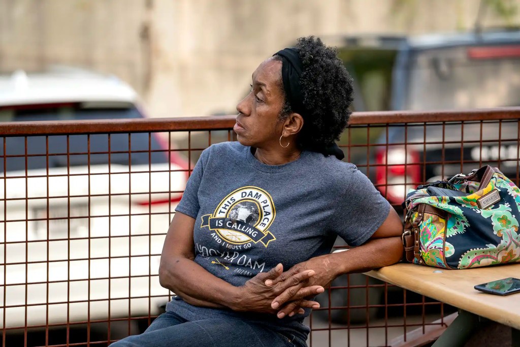 A woman attends a meeting outside Atlanta Utility Works in East Point, Georgia.