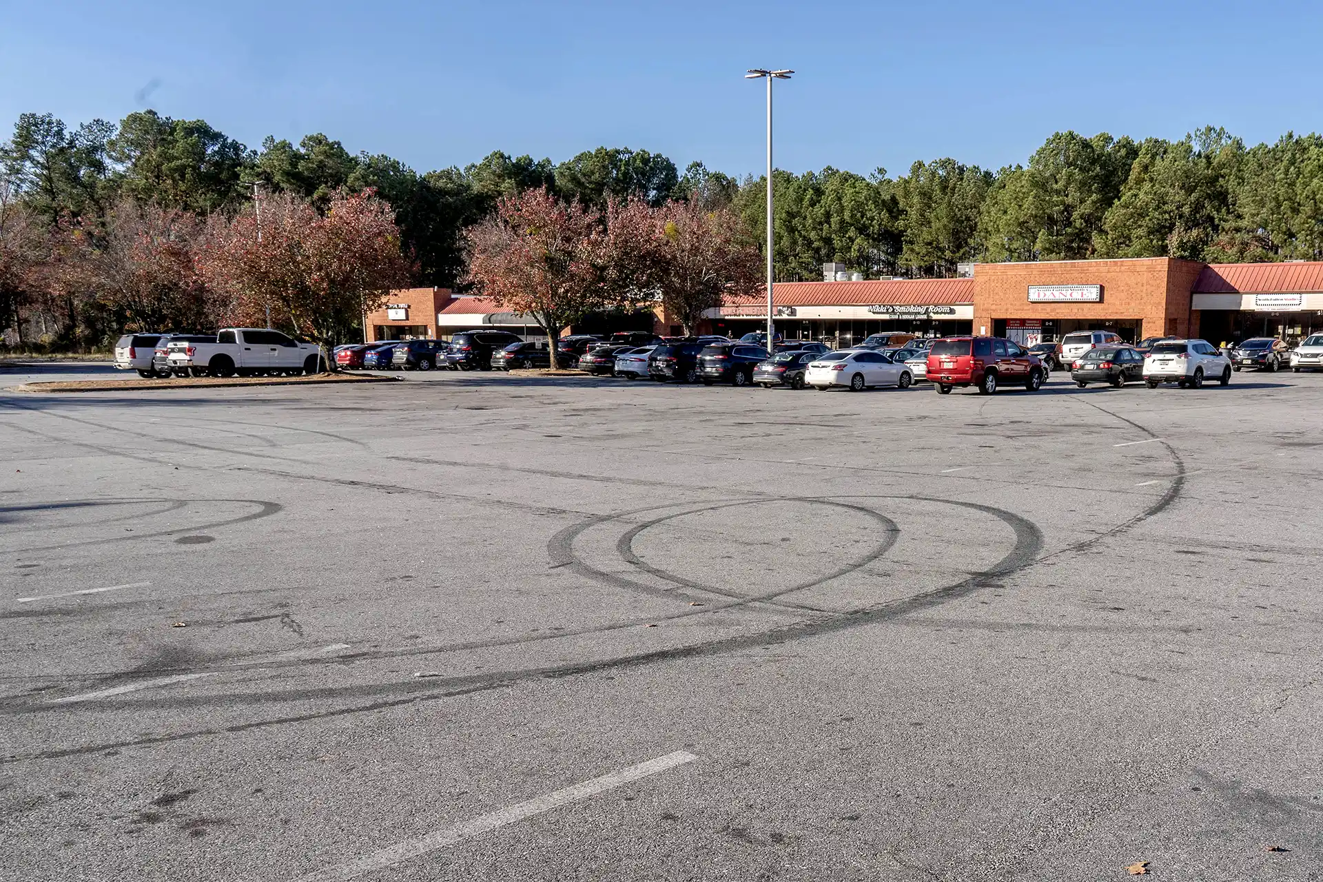The parking lot for Harold's Chicken and Ice Bar.