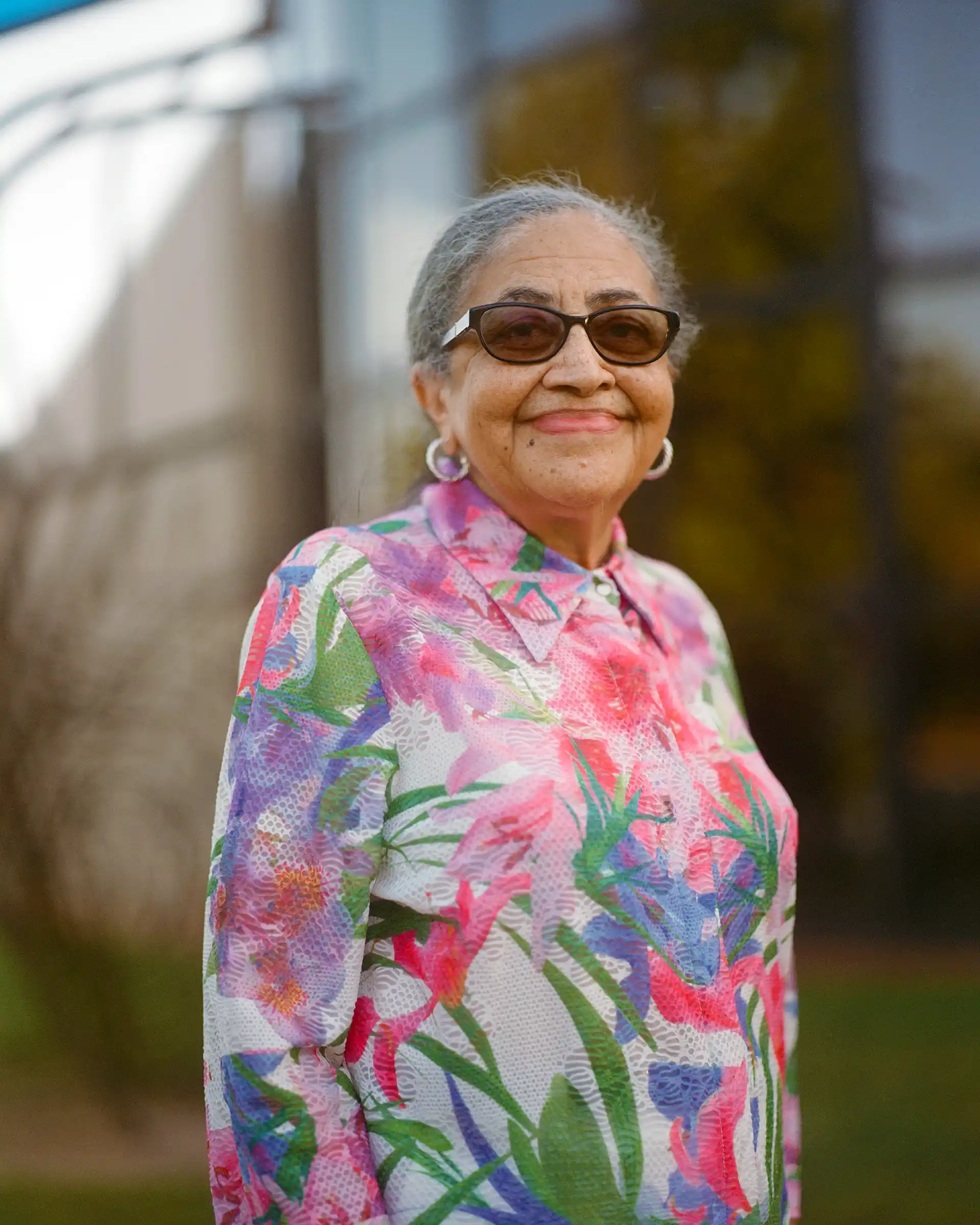 Viola Turner stands in front of the Viola Turner Theater at Tri-Cities High School in East Point, Georgia.