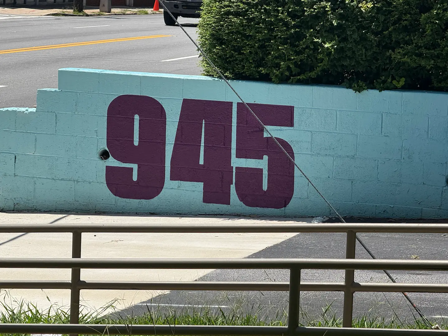 A photo of a mural along the street.